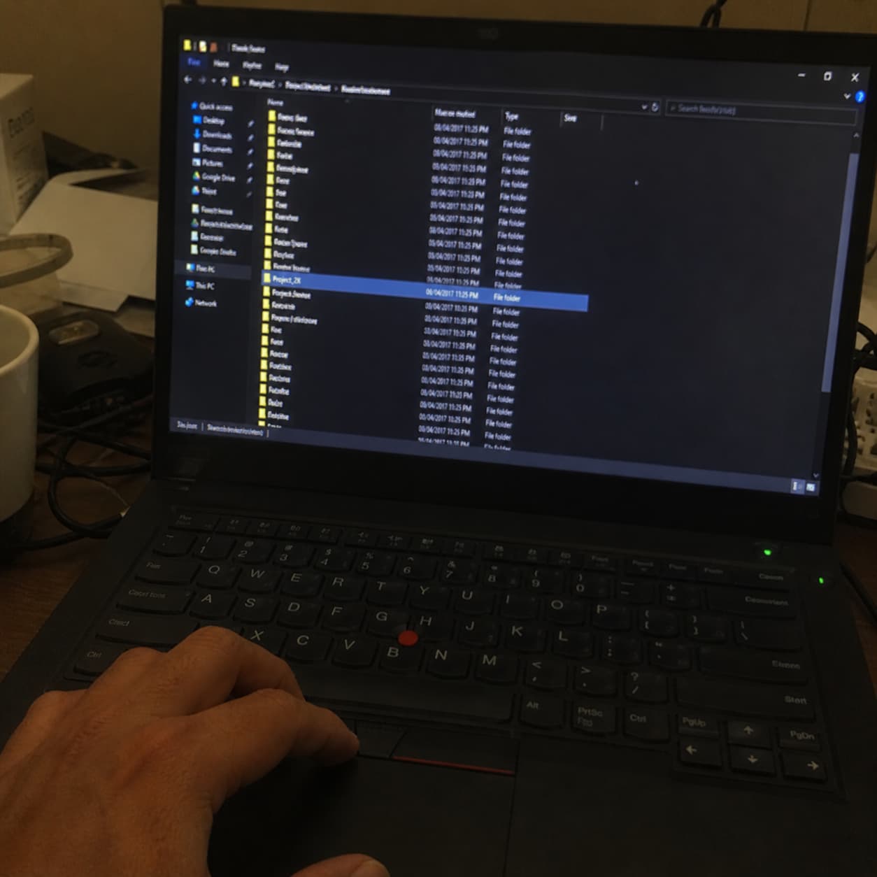 Archive folders open on a laptop revealing the audio file